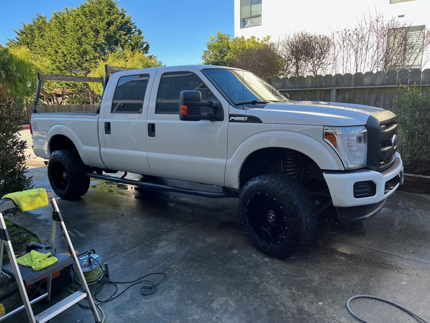 White lifted Ford F-250 Super Duty after detailing