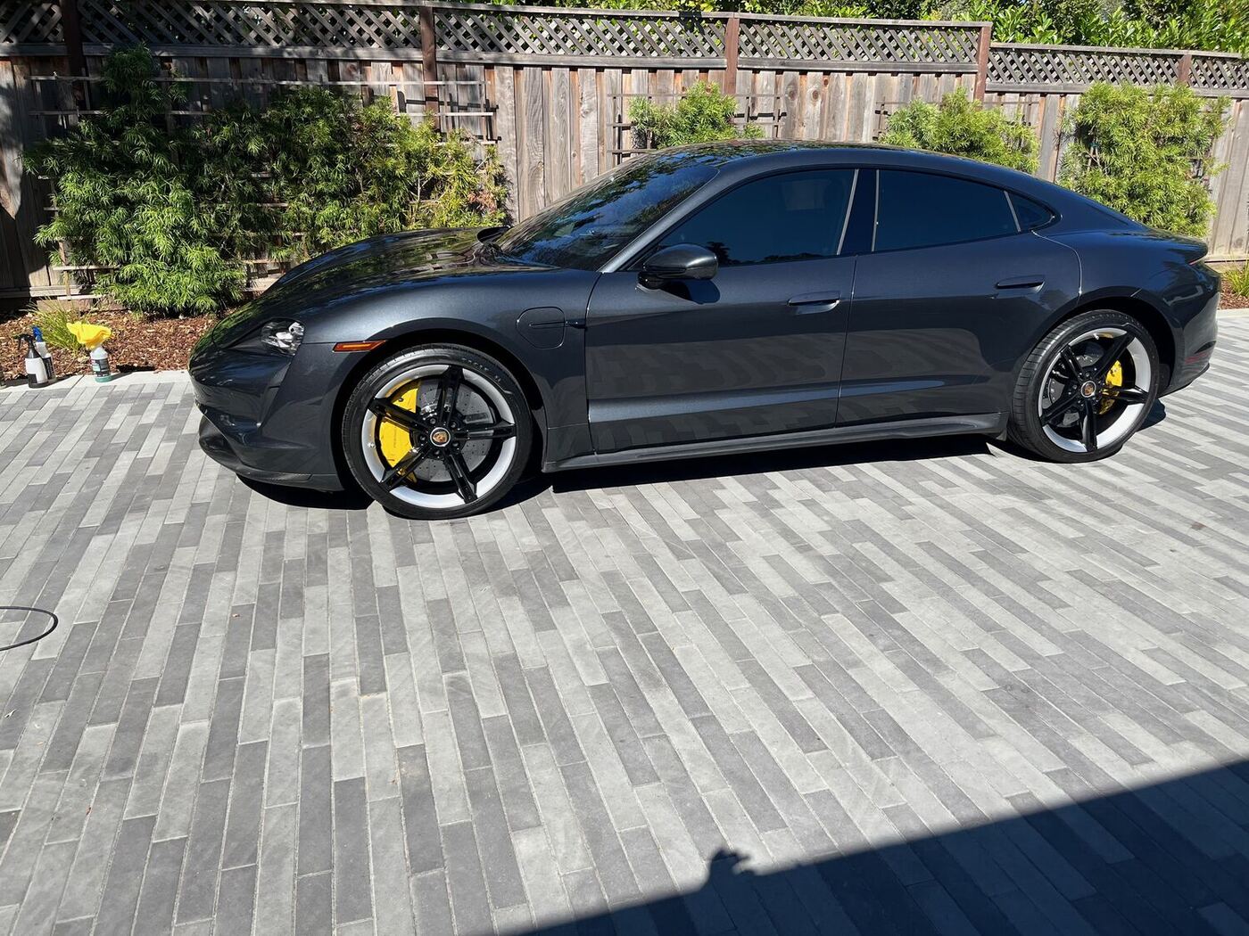 Grey Porsche Taycan after detailing
