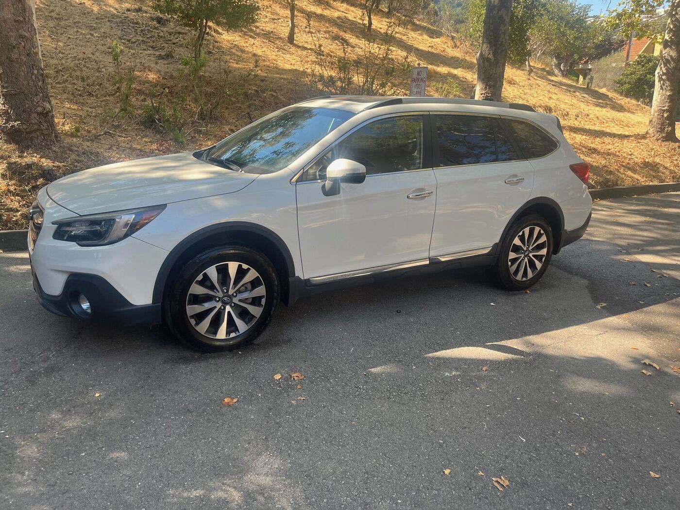 White Subaru Outback after detailing